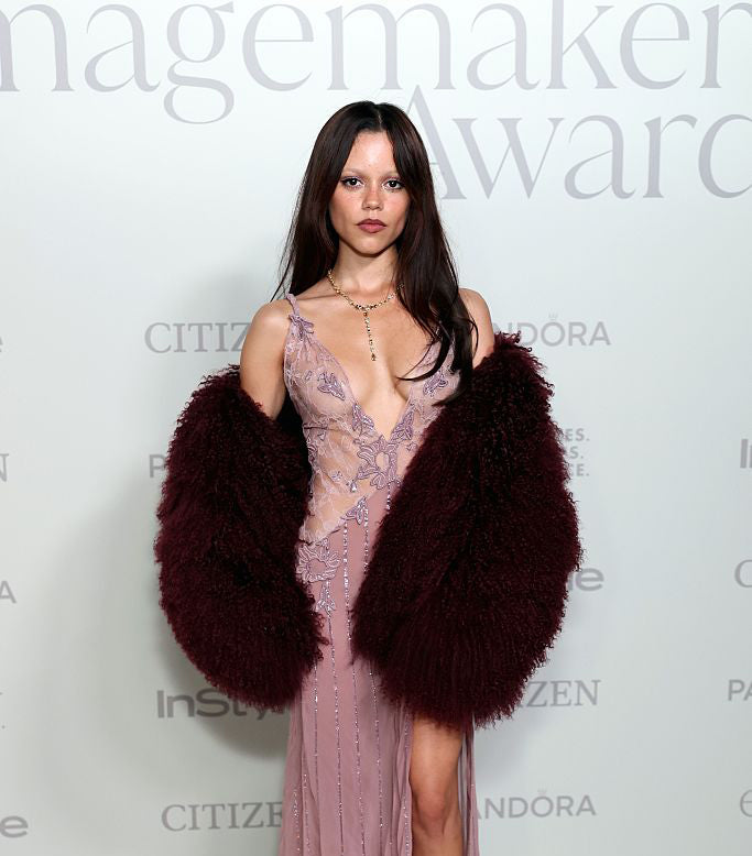 Jenna Ortega wears the Rochelle Shearling Coat in Burgundy