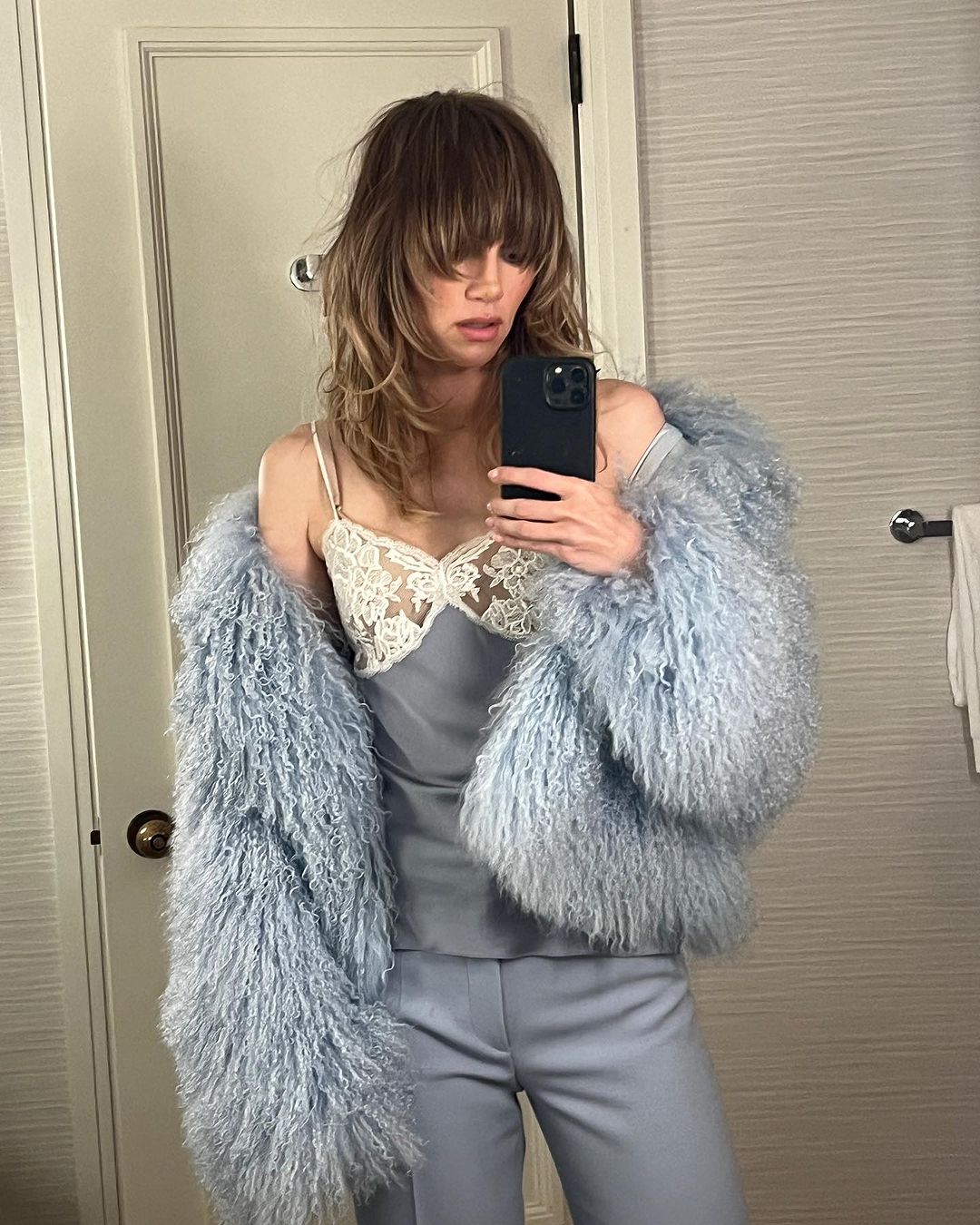 Suki Waterhouse Reimagines the Mirror Selfie in Ducie's Rochelle Shearling