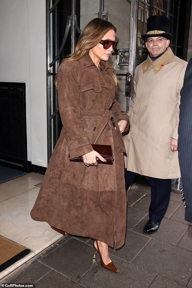 JLO wears the Corrin Suede Trench Coat in Coco for her London press tour