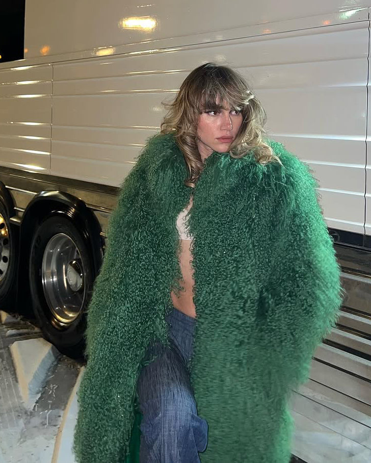 Suki Waterhouse Sparkles in Ducie's Bespoke Faye Coat for Tour Finale